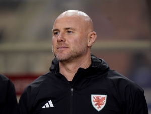 Rob Page says Wrexham’s Paul Mullin must prove himself in EFL to earn Wales call