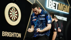 Luke Humphries secures first Premier League win with victory over Michael Smith