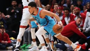 Booker sidelined by groin problem recurrence as Suns lose to Nuggets in overtime