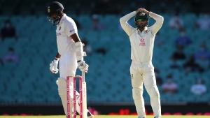 India frustrate Australia to hold on for draw in Sydney
