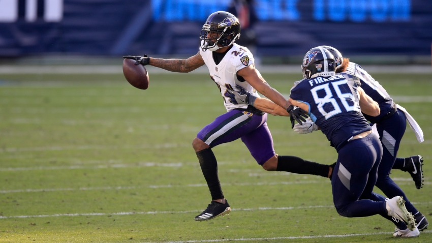 Three-time Pro Bowl cornerback Marcus Peters returns to Ravens practice 11 months after ACL injury