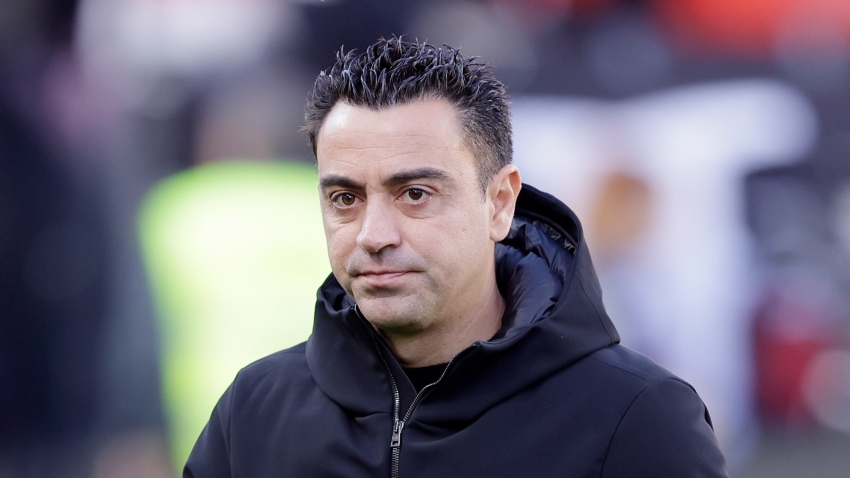 Xavi commits U-turn and elects to stay at Barcelona