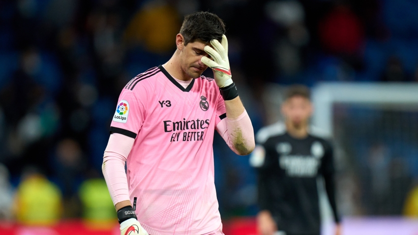 Real Madrid's Courtois faces spell on sidelines after hernia injury with Belgium