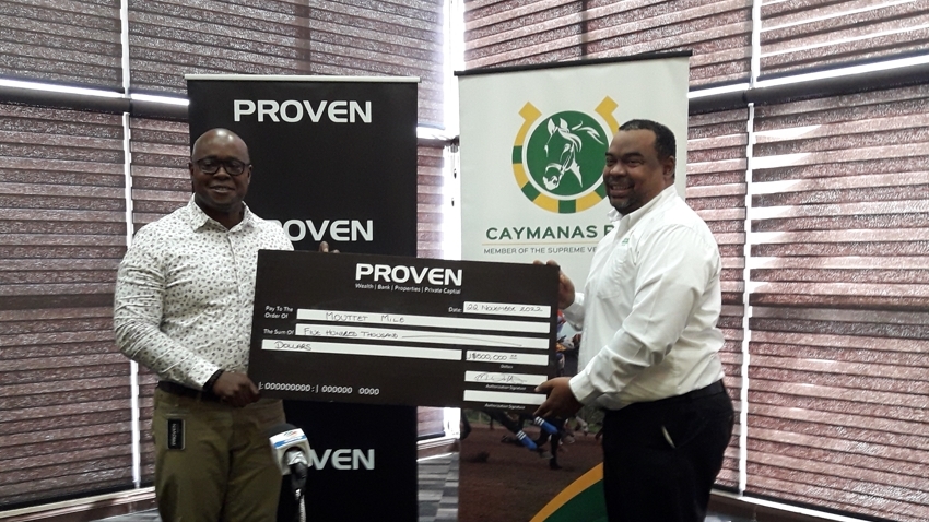 Assistant Vice President-Wealth Management at PROVEN Wealth Miguel Walker (left) and Executive Chairman of Supreme Ventures Limited Gary Peart.