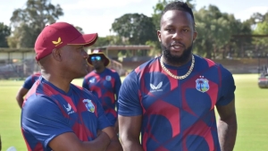 Brian Lara speaking to current West Indies all-rounder Kyle Mayers.