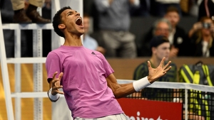 Auger-Aliassime takes third straight title to continue stunning 2022 season