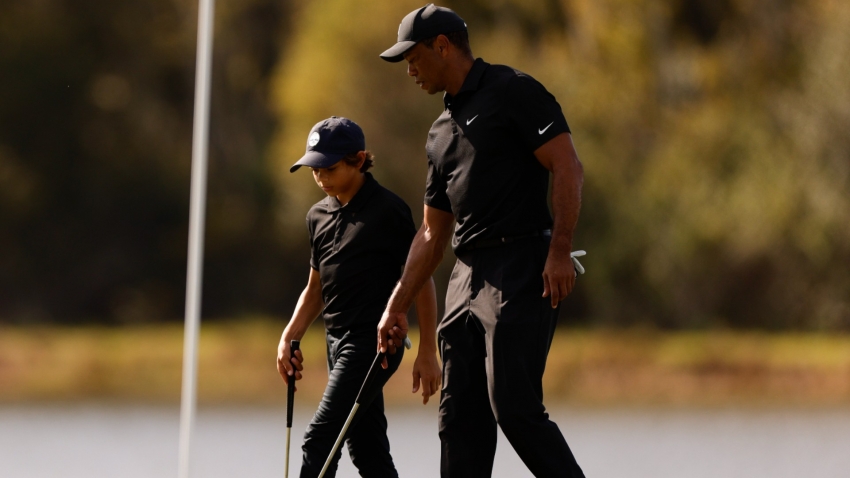 Tiger Woods warns competitive return &#039;long way off&#039; after making comeback alongside son