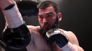 Beterbiev beats Brown with another KO to retain belts in bloodfest