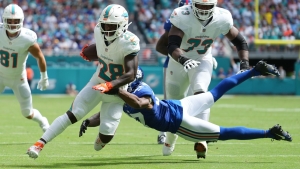 Dolphins running back Achane reportedly to miss multiple weeks with injured knee