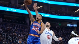 Curry hits 45 points as Warriors edge Clippers, Giannis&#039; Bucks routed by Heat