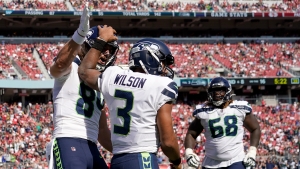 Wilson celebrates 100th NFL win as Seahawks take down 49ers, Cardinals improve to 4-0