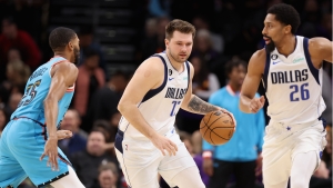 Doncic looked &#039;fine&#039; and was &#039;smiling&#039; after leaving early in the Mavs&#039; win over the Suns