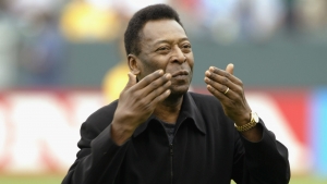 Pele &#039;punching the air&#039; after being discharged from hospital