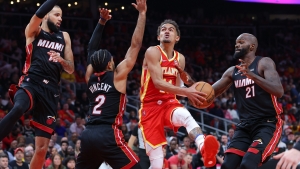 Trae Young hits game-winner against Miami, Suns survive without Booker