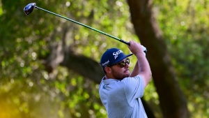 NeSmith ties Copperhead course record to lead after second round