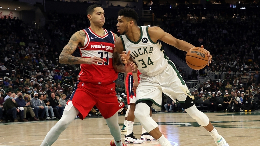 Giannis triple-double as Bucks bounce back, Warriors win without All-Stars