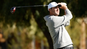 Defending champion Scottie Scheffler leads by two strokes after Friday at the Phoenix Open