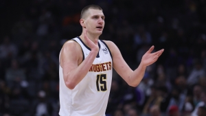 Jokic &#039;just different&#039; as Nuggets center boosts back-to-back MVP bid in OT win