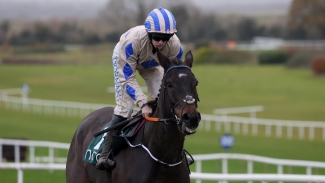Captain Guinness rises to the occasion in incident-packed Champion Chase