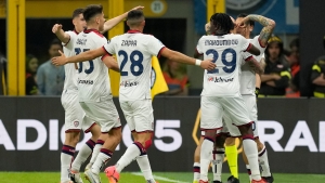 Cagliari cool Inter Milan charge to Serie A title with draw at San Siro
