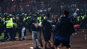 At least 129 people killed after stampede and violence at Indonesian Liga 1 match