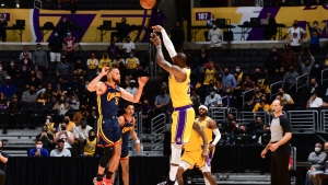 LeBron drains late three as Lakers progress to playoffs, Warriors to face Grizzlies