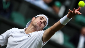 Wimbledon: Isner breaks Karlovic&#039;s ATP Tour ace record