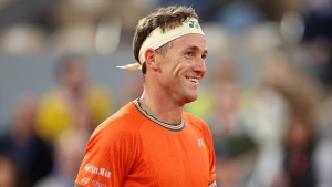 Ruud edges into French Open third round after rollercoaster match