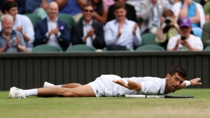 Wimbledon: Djokovic revels in reflected glory as mirror pep talk saves the day against Sinner
