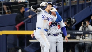 Ohtani helps Dodgers rally to win season opener