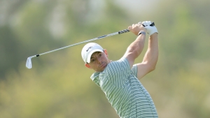 McIlroy moves within two shots of leader Harding in Dubai