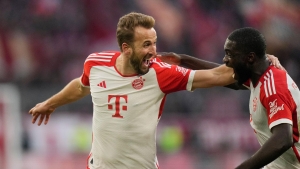 Record-breaking Harry Kane helps fire Bayern Munich to top of Bundesliga