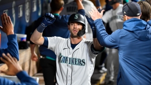 Haniger leads Mariners in rout of A&#039;s, Reds keep faint hopes alive