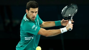 Australian Open: Djokovic eases past Chardy in strong start to title defence