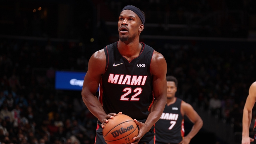 Jimmy Butler sprains ankle, misses second half of Miami win