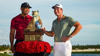 Hovland wins Hero World Challenge in front of Tiger Woods