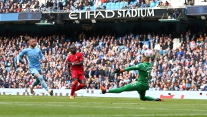 Manchester City 2-2 Liverpool: Mane keeps Reds hopes alive as title rivals fight out a thriller
