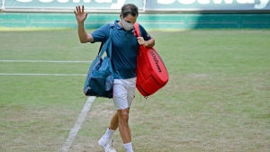 Federer loses in second round at Halle for first time as Auger-Aliassime claims stunning win