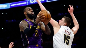Lakers rally the troops to beat the Nuggets but face anxious wait after Davis injury