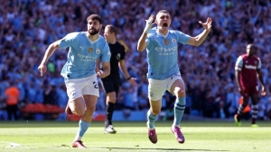 Manchester City 3-1 West Ham: Foden scores twice as champions retain title