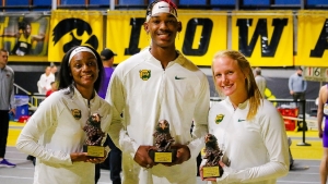 Track MVP Ackera Nugent (left) stands alongside teammates Johnny Brackins and Tuesdi Tidwell, who were named Field Event MVPs at the meet on Saturday.