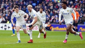 Impressive Leeds score three at Cardiff to stay in pursuit of the top two