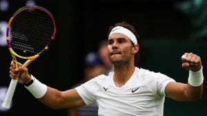 Wimbledon: Nadal survives Berankis battle to overtake Navratilova on slam list