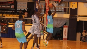 Action between the Caribbean Basketball Academy and Blue Mahoe Basketball on day one of the 2023 Jamaica Basketball Showcase.