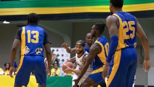 Storm&#039;s Brandon &quot;BDot&quot; Armstrong is surrounded by Rivers players as he tries to take a shot in the second match of fifth round of the Elite 1 Caribbean Basketball Winter League on Saturday January 21 at the National Arena.  