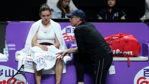 Halep splits with long-time coach Cahill