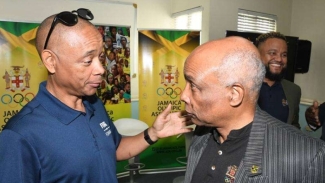 Christopher Samuda (right), Jamaica Olympic Association president in discussion with Jamaica Football Federation&#039;s general secretary Dennis Chung during a press brifing at JOA&#039;s offices on Monday.