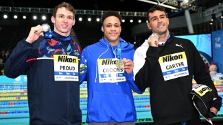 Crooks (centre) was winning a first-ever global medal for himself and the Cayman Islands. T&amp;T&#039;s Carter (right) continued his impressive 2022 with a bronze medal.