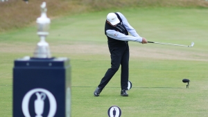 The Open: Woods and McIlroy raring to go as Lawrie tees off at St Andrews