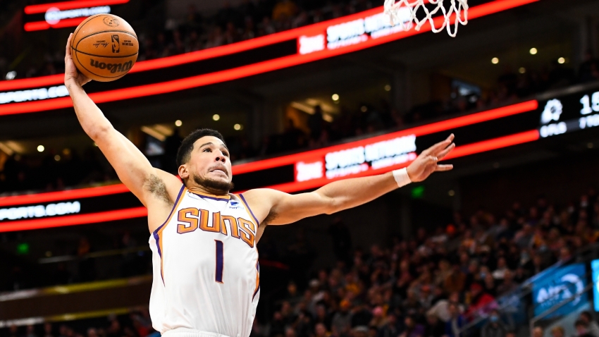 Booker sets franchise record as Suns win eighth straight, Cavs down Giannis' Bucks